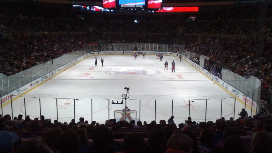 Ice hockey rink inside Madison Square Garden during a game, seen from the stands