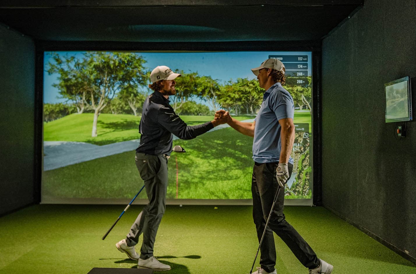 Play with rising golf pros at a private indoor simulator lounge