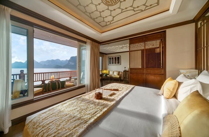 Revel in a private golden hour toast on a cruise through Hạ Long Bay