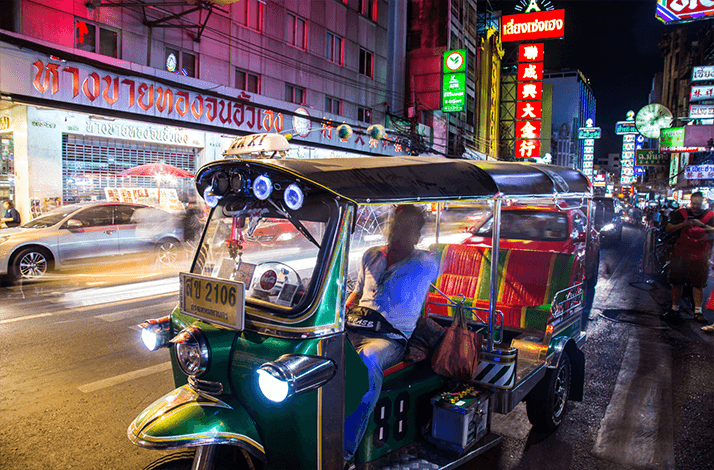 Uncover Bangkok's late-night street food scene on a tuk-tuk tour