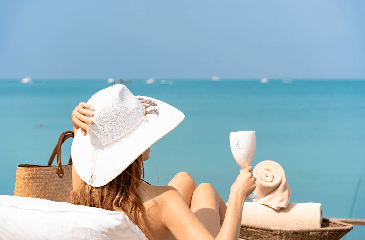 Enjoy a reserved pool bed at Nikki Beach Koh Samui